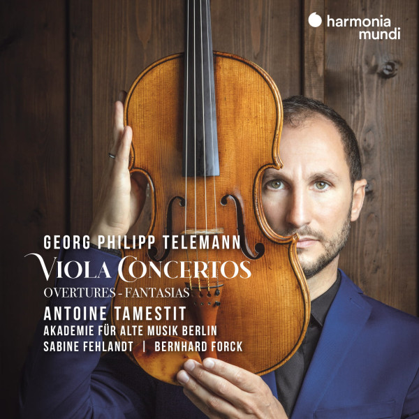 Fotografie eines Mannes mit einer Bratsche in der Hand. Davor Informationen zu Komponist, Werk und Mitwirkenden.