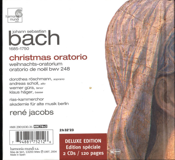 Rückseite der Deluxe Edition „Bach Christmas Oratorio BWV 248“ unter René Jacobs auf weißem Hintergrund, rechts im Bild erscheint der Hinterkopf einer Frauenskulptur.
